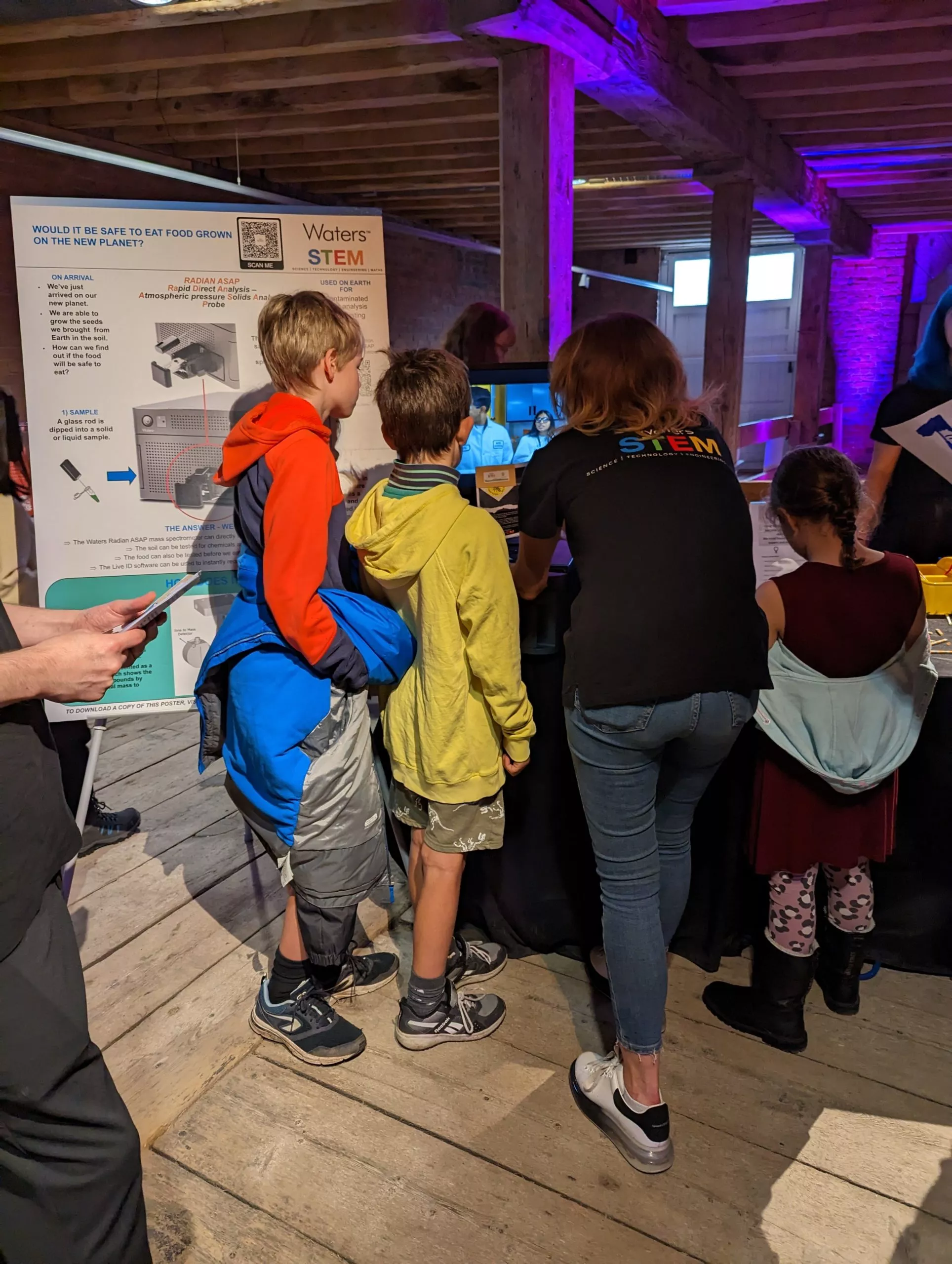 family at manchester science and industry museum exhibit