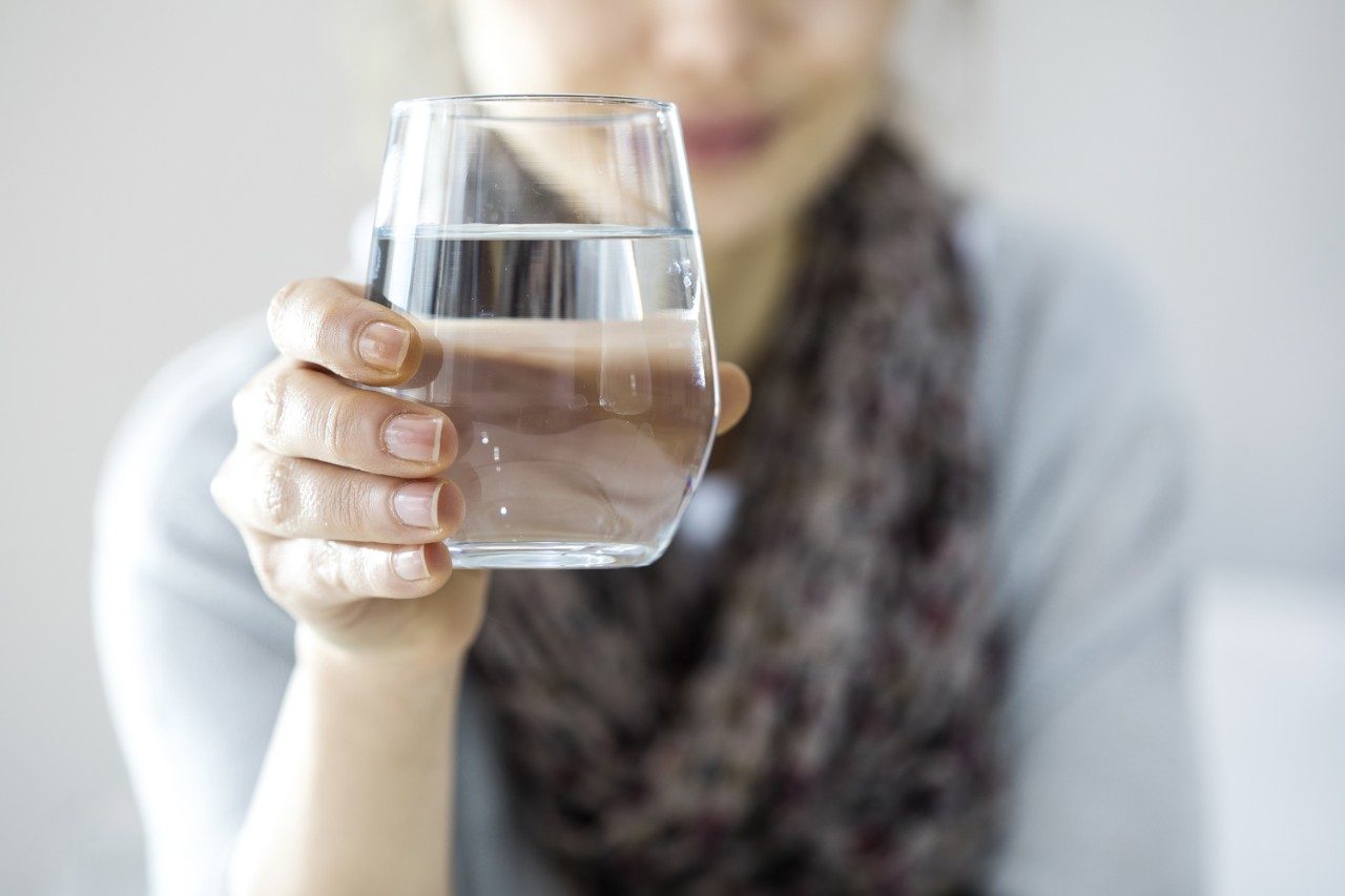 Drinking water in glass