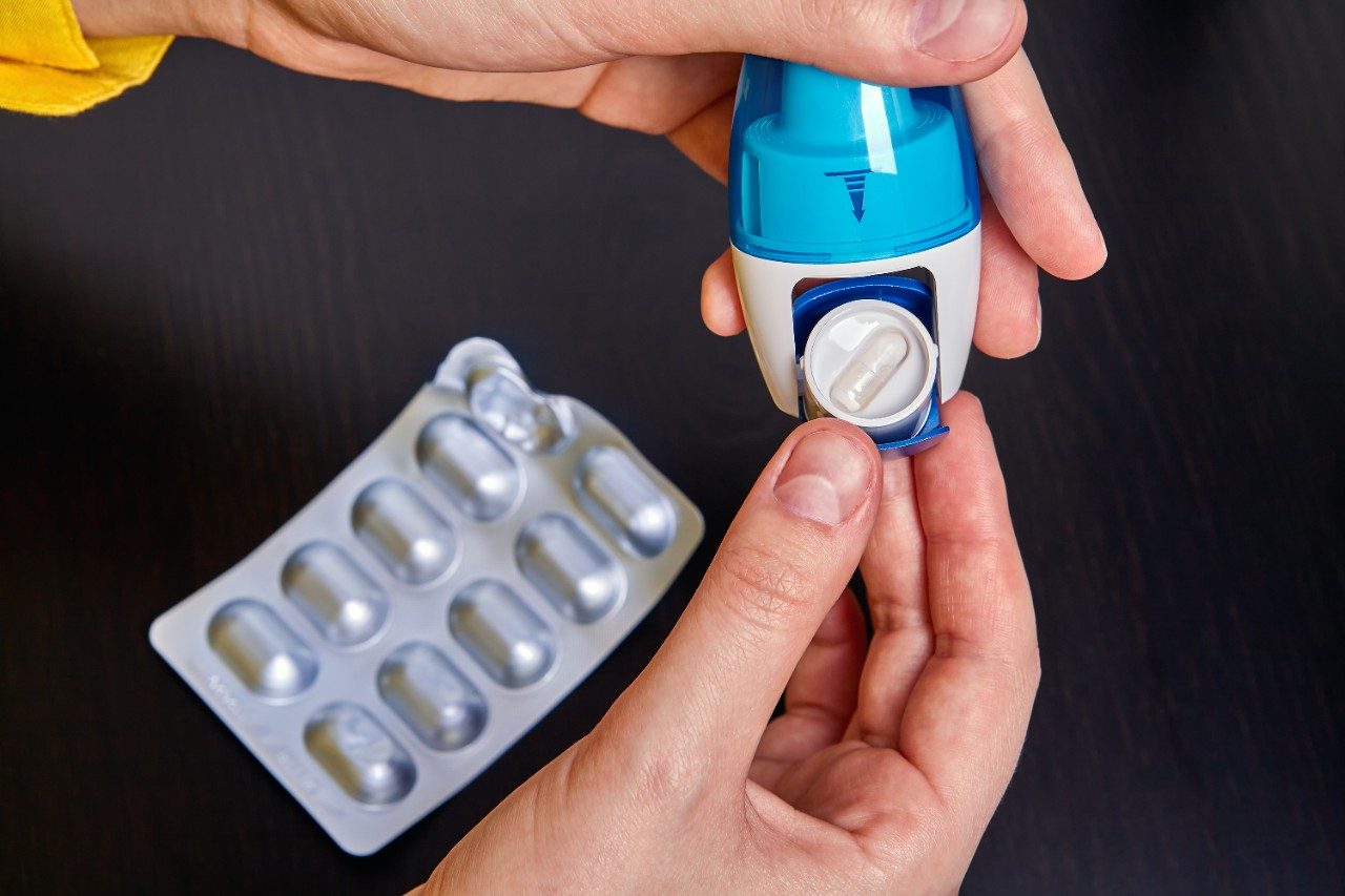 Budesonide and formoterol powder pills for inhaler